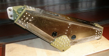 The composite adhesively bonded flap-track beam of A400M.